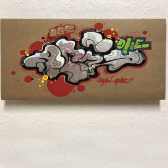 Acrylmarker-Graffiti auf Pappe